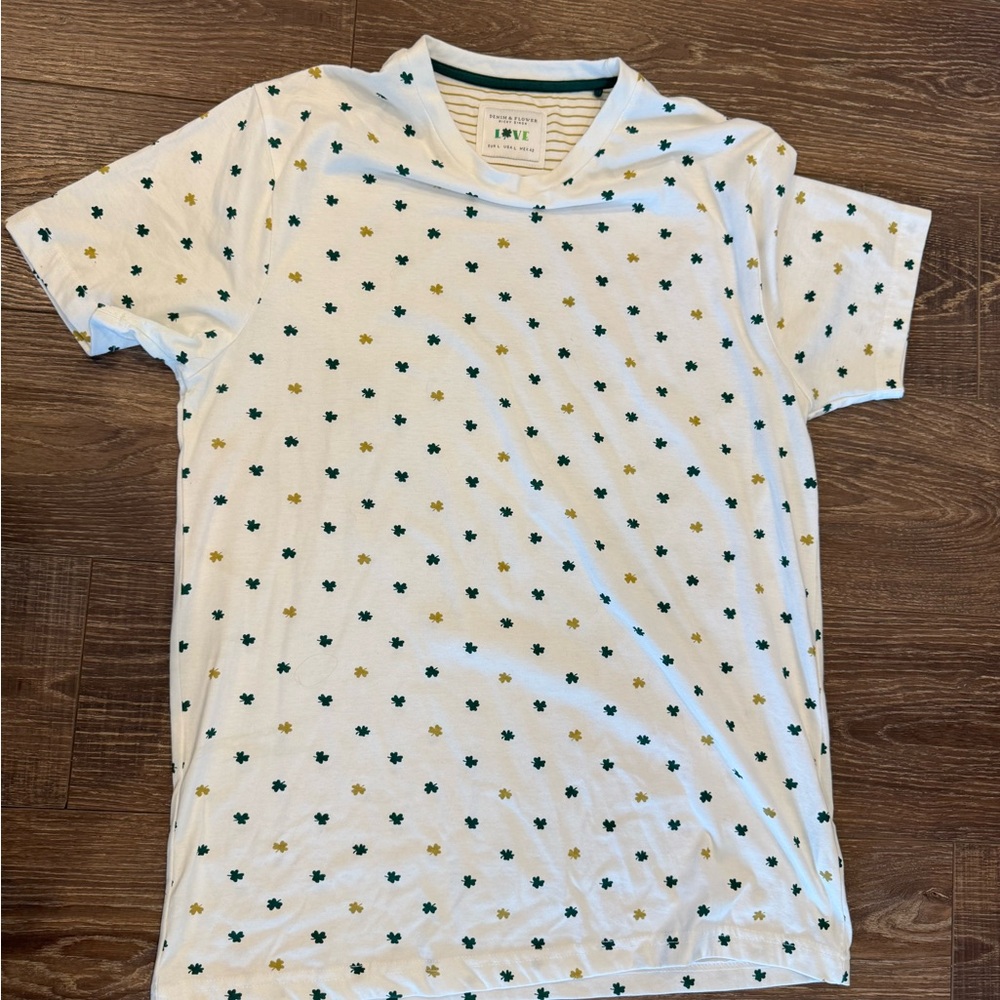 **DONATED** 
Denim & Flower White Tee with Green and Yellow shamrocks